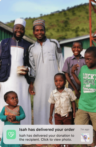Image of Imam delivering food pack to a family